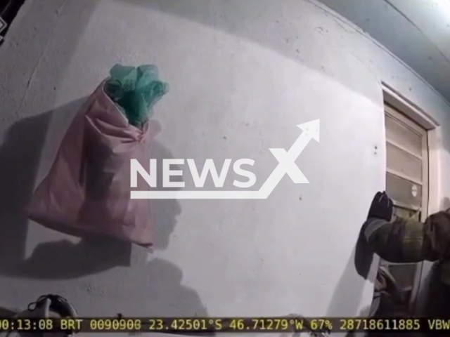 Video shows the moment of explosion as police officers raid a house in Sao Paulo, Brazil, on Dec.12,2025. Seven people were injured. Note: Photo is a screenshot from a video(PMSP/Newsflash)