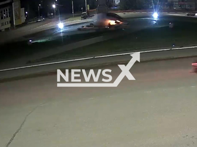 This image is a screen grab of the video supplied titled NewsX-RegionCrash-01.mp4: Footage shows car crashing into monument in Kamyshin, Volgograd Oblast, Russia on Sunday, Dec. 14, 2025.(Clipzilla)