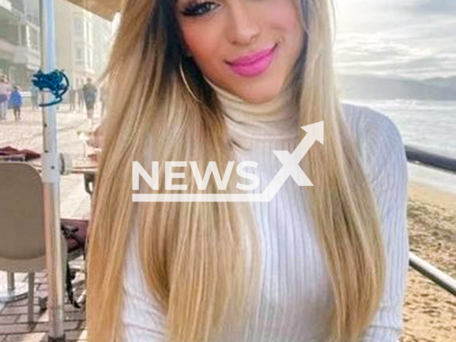 Bianca Ferreria da Rocha Pimenta, 30, poses in undated photo. She died after being run over while trying to return from Romania to Portugal. Note: Private photo. (Newsflash)