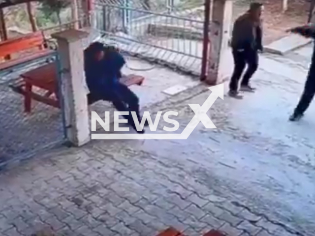 This image is a screen grab of the video supplied titled NewsX-BusStopGun-01.mp4: Footage shows 12-year-old boy shooting the school principal with a gun at bus stop in Anamur, Mersin Province, Turkey on Monday, Dec. 22, 2025.(Clipzilla)