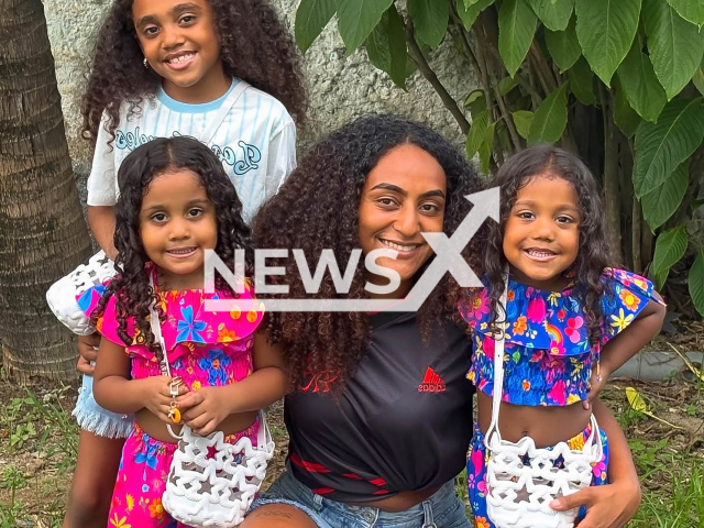 Kathleen Nicole Ramos Santos, 24, poses with daughters in undated photo. She became pregnant while already pregnant in Nova Iguacu, Rio de Janeiro, Brazil. Note: Private photo taken from social media. (@nicoole_carvalhooo/Newsflash)
