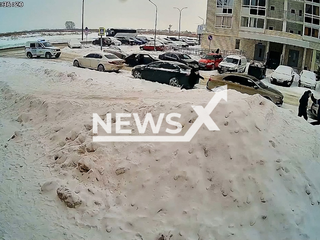 This image is a screen grab of the video supplied titled NewsX-FledCrash-01.mp4: Footage shows a Lada crashing into a parked car and the driver and passengers fled in Naberezhnye Chelny, Republic of Tatarstan, Russia on Sunday, Jun. 11, 2026.(Clipzilla)