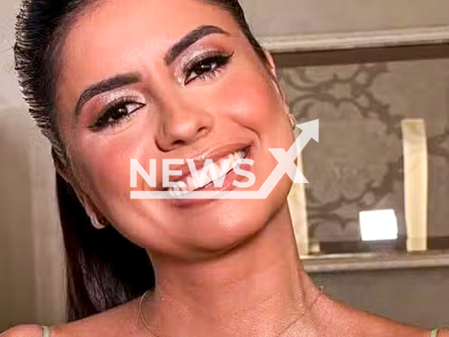 Juliane Vieira, 28, poses in undated photo. She hung from an air conditioning unit to rescue her mother and cousin during a fire in Cascavel, Brazil, Oct. 15, 2025. Note: Private photo. (newsX)