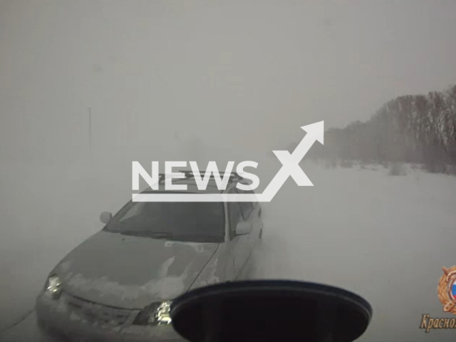 This image is a screen grab of the video supplied titled NewsX-SnowCloudCra-01.mp4: Footage shows Toyota Caldina driver veering into oncoming traffic and colliding head on with a Gazelle van in Rybinsky District, Krasnoyarsk Krai, Russia on, Tuesday, Jan. 13, 2026.(Clipzilla)
