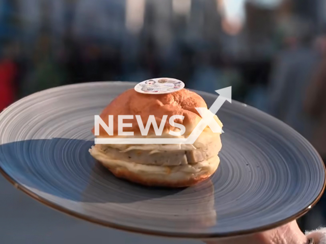 Munich residents create a new type of donut with white sausage filling, undated photo. The new delicacy was invented by Thomas Vollmer. Note: Image is a screenshot from a news media video. (Newsflash)