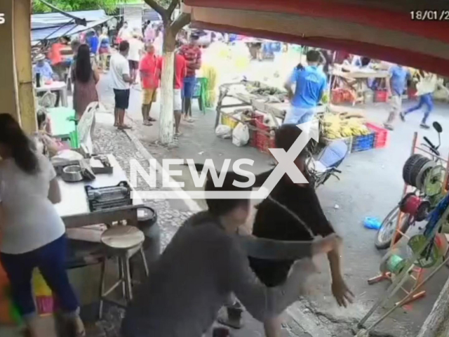 This image is a screen grab of the video supplied titled NewsX-GunBro-01.mp4:  Footage shows a suspect attempting to kill a shopkeeper before fleeing on foot after his gun malfunctioned and the victim fought back and disarmed him in Mucambo, Ceara, Brazil on Sunday, Jan. 18, 2025.(Clipzilla)