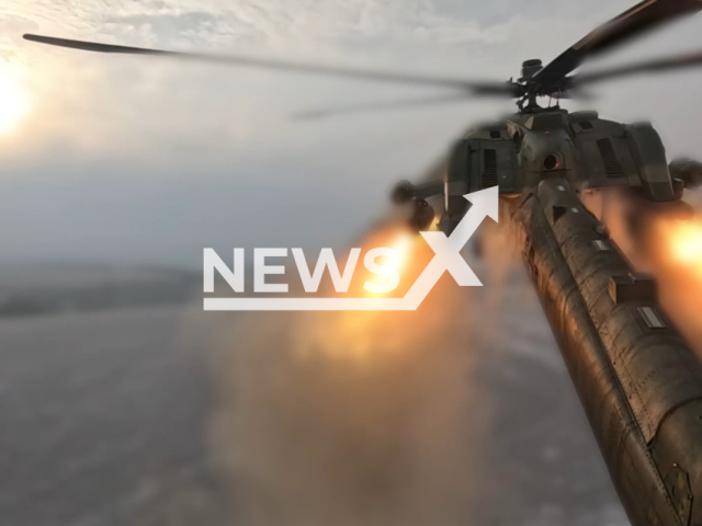 This image is a screen grab of the video supplied titled NewsX-HelicopterRaid-01.mp4: Footage shows a Russian Mi-28NM unleashing missiles on Ukrainian rotating forces on the front lines in Ukraine on Wednesday, Jan. 21, 2026.(Clipzilla)
