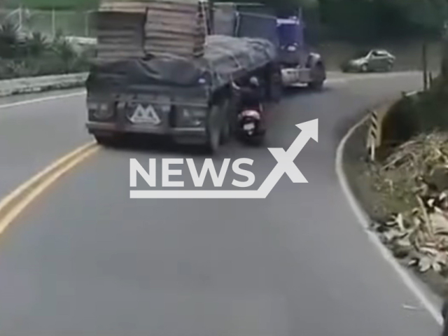 A lorry almost crushes a biker in Antioquia, Colombia, on Jan.16,2026. Note: Photo is a screenshot from the video (Newsflash)