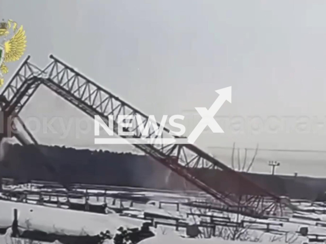This image is a screen grab of the video supplied titled NewsX-CollapseOld-01.mp4:  Footage shows a crane collapsing during operation in Bugulma, Republic of Tatarstan, Russia on Sunday, Jan. 18, 2026.(Clipzilla)