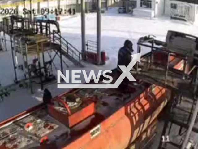 This image is a screen grab of the video supplied titled NewsX-TankerIgnites-01.mp4: Footage shows fuel tanker goes up in flames leaving the worker with burns at at a Pegas gas station in the village Zhanaaul, Pavlodar Region of Kazakhstan on Saturday, Jan. 24, 2026.(Clipzilla)
