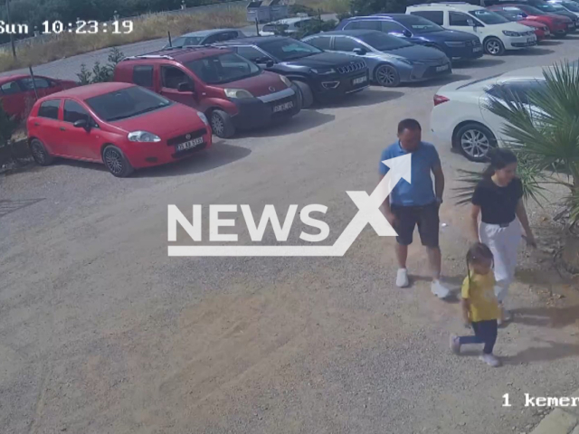 Picture shows the couple and their child before decorative arch fell over them in Menemen district of Izmir, Turkey, May 25, 2025. Doctor Mehmet Baltaci, 35, and his wife Guler Baltaci, 35, lost their lives. Note: Photo is a screenshot from the video (Newsflash)