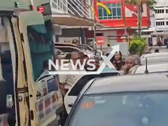 Picture shows the incident scene, undated. A two-year-old boy died after his mother forgot him in the car in Seremba, Malaysia. Note: Image is a screenshot from video. (Newsflash)