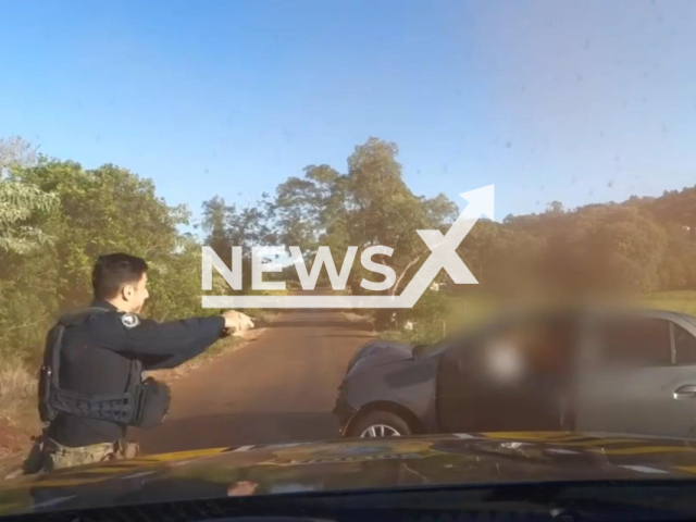 This image is a screen grab of the video supplied titled NewsX-CopsDrugs-01.mp4: Footage shows police sizing car full of drugs after high speed chase in Ceu Azul, Parana, Brazil on Friday, Jan. 23, 2026.(Clipzilla)
