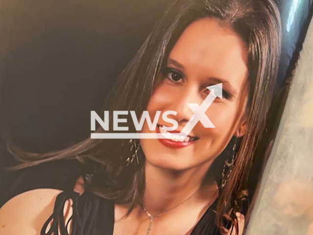 Picture shows pharmacist Renata Bocatto Derani, undated. The 38-year-old woman was surprised by a gunman at her workplace and died instantly in Uberlandia, Brazil. Note: Image is a screenshot from video. (Newsflash)