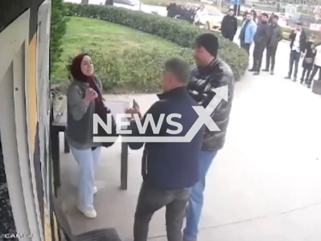 This image is a screen grab of the video supplied titled NewsX-AttackTaxi-01.mp4: Footage shows woman attacking the taxi stand after being refused for taxi in Bursa, Turkey on Tuesday, Feb. 3, 2026.(Clipzilla)