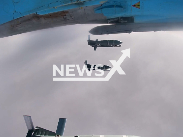 This image is a screen grab of the video supplied titled NewsX-AerialBomb-01.mp4: Footage shows Russian Su-34 fighter jet dropping aerial bombs with a universal planning and correction module at Ukrainian military positions on the frontlines in Ukraine on Monday, Feb. 9, 2026.(Clipzilla)
