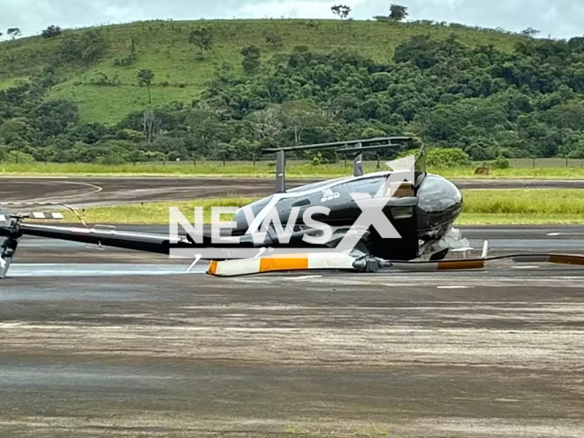 Picture shows the crashed helicopter, undated. Man invaded airport to test a helicopter and crashed it at Caxambu airport, in southern Minas Gerais, Brazil. Note: Police photo. (Military Police/Newsflash)