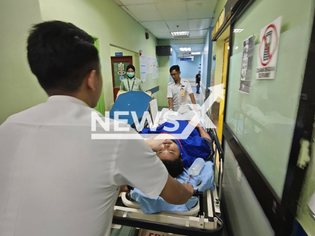 Picture shows one of the injured people in the traffic accident in Kuala Lumpur, Malaysia, undated. The crash involved two motorcycles and four cars. Note: We have obtained permission for this photo. (Ijul Pakngah/Newsflash)