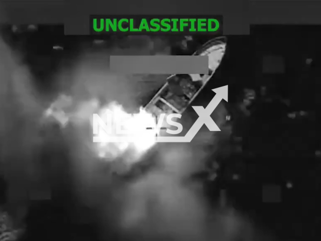 This image is a screen grab of the video supplied titled NewsX-DrugVessel-01.mp4: Footage shows a U.S. military destroying a suspected narco-trafficking vessel with a precision lethal kinetic strike capturing the explosion on impact and the aftermath with debris scattered across the water in the Eastern Pacific on Monday, Feb. 9, 2026.(Clipzilla)