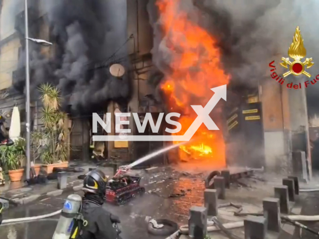 This image is a screen grab of the video supplied titled NewsX-PizzeriaFire-01.mp4: Footage shows firefighters battling an intense blaze at a historic pizzeria in Secondigliano, Naples, Italy on Monday, Feb. 9, 2026.(Clipzilla)