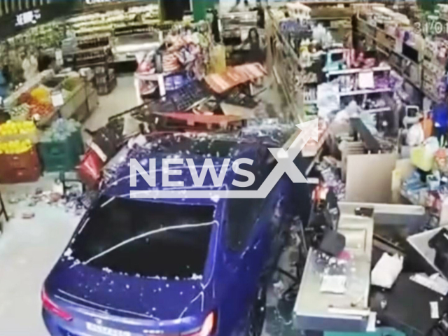 This image is a screen grab of the video supplied titled NewsX-SuperBeemer-01.mp4: Footage shows BMW crashes into a market in downtown Cascavel, Parana, Brazil on Saturday, Jan. 31, 2026.(Clipzilla)