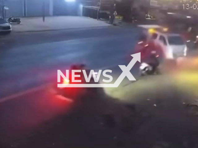 This image is a screen grab of the video supplied titled NewsX-TruckCollided-01.mp4: Footage shows truck crashing into a truck and two motorbikes killing three people in Nhan Co, Lam Dong province , Vietnam on Friday, Feb. 13, 2026.(Clipzilla)