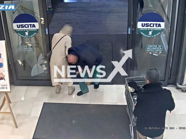 This image is a screen grab of the video supplied titled NewsX-SuperBebys-01.mp4: Footage shows 37-year-old Romanian man attempts to steal a one-and-a-half-year-old girl from mother in supermarket in Bergamo, Italy on Saturday, Feb. 14, 2026.(Clipzilla)