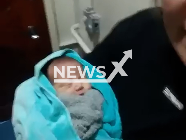 Video shows the premature baby rescued inside cooler after shipwreck in Manaus, Brazil, undated footage. The baby was placed in a plastic cooler to prevent drowning. Note: Photo is a screenshot from a video. (Newsflash)