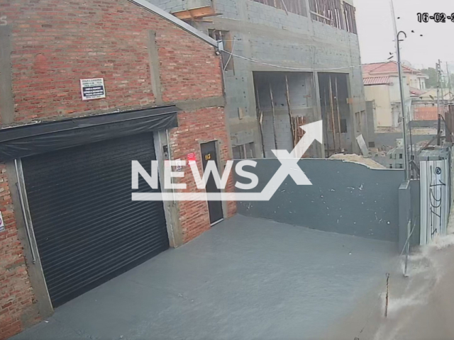This image is a screen grab of the video supplied titled NewsX-FloDrift-01.mp4: Footage shows 60-year-old woman falls and being swept away by a strong flash flood during the storm in Mandaqui, Sao Paulo, Brazil on Monday, Feb. 16, 2026.(Clipzilla)