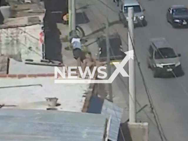 This image is a screen grab of the video supplied titled NewsX-CreshWire-01.mp4: Footage shows man being a construction worker falls from a second floor after receiving a powerful electric shock in Cordoba, Argentina on Thursday, Feb. 19, 2026.(Clipzilla)