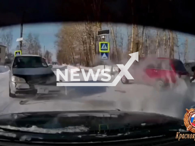 This image is a screen grab of the video supplied titled NewsX-ChainReaction-01.mp4: Footage shows a driver failing to yield at an uncontrolled intersection, triggering a collision that led to a pedestrian being struck and a subsequent impact with another vehicle in Lesosibirsk, Krasnoyarsk Krai, Russia on Friday, Feb. 20, 2026.(Clipzilla)