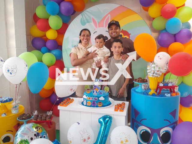 Picture shows the couple with their children during a birthday party of their youngest son, undated. The victims of the house fire have been identified as Jessica da Silva Brazeiro, 32, Gabriel Machado de Souza, 26, and the couple's son, Ravi, 1 year and 3 months old. Note: Private photo taken from social media. (Newsflash)
