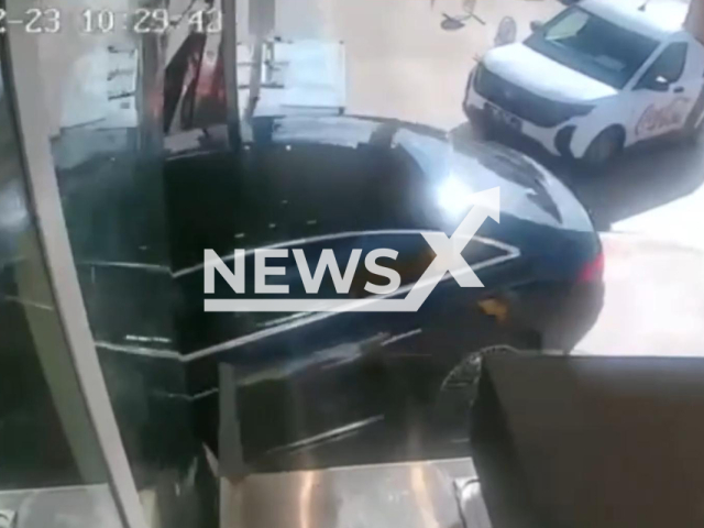 This image is a screen grab of the video supplied titled NewsX-CarWindowAccident-01.mp4: Footage shows a car out of control crashing into a pastry shop in Etimesgut, Ankara, Turkey on Feb. 23, 2026.(Clipzilla)
