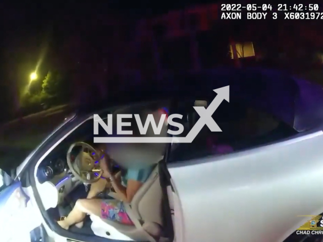 Deputy Williams legitimizes the lady that almost hit him on 4th of May 2022 in Hillsborough County, FL. Note: Picture is a screenshot from a video (Hillsborough County Sheriff's Office/Clipzilla)