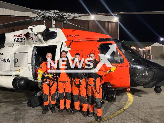 4 coastguards standing in front of their helicopter after the rescue, Montauk, New York on 8th of May 2022.  Note: This picture is from U.S. Coast Guard Northeast (U.S. Coast Guard Northeast/Clipzilla).