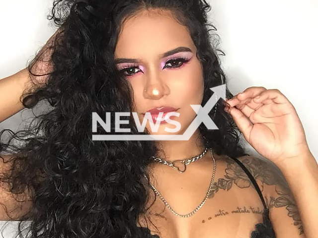 Ana Vitoria Santana da Rocha, 24, poses in undated photo. She was shot dead in Seropedica, Brazil. Note: Private photo taken from social media. (Newsflash)