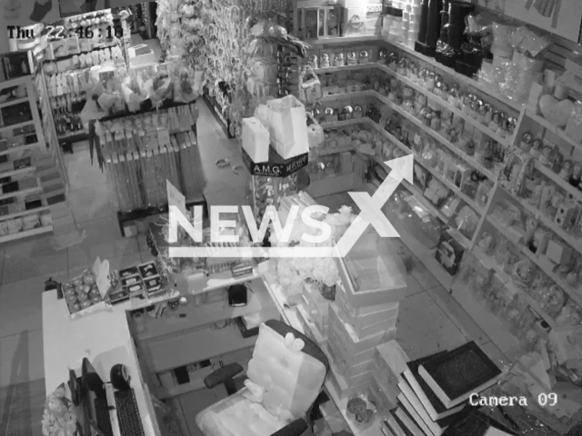 This image is a screen grab of the video supplied titled NewsX-BeirutStrike-01.mp4: CCTV inside a shop captures the moment a powerful strike hits nearby sending debris and shockwaves through the business premises as the blast rocks the area in Beirut’s southern suburbs, Lebanon on Thursday, Mar. 5, 2026(Clipzilla)