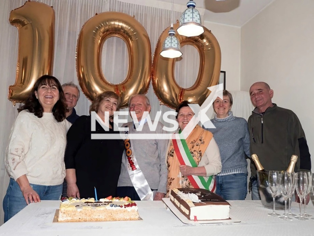 Picture shows Elio Balacca with unnamed people during the birthday celebration, undated. He celebrated his 100th birthday. Note: Photo from the municipality. ( Municipality of Riccione/Newsflash)