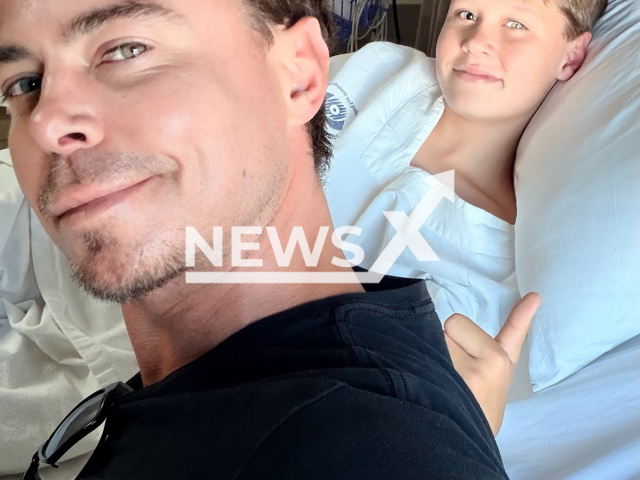 Bobby van Jaarsveld and his son pose in undated photo. His son lost sight after a laser was pointed at him. (@bobbyvanjaarsveld/Newsflash)