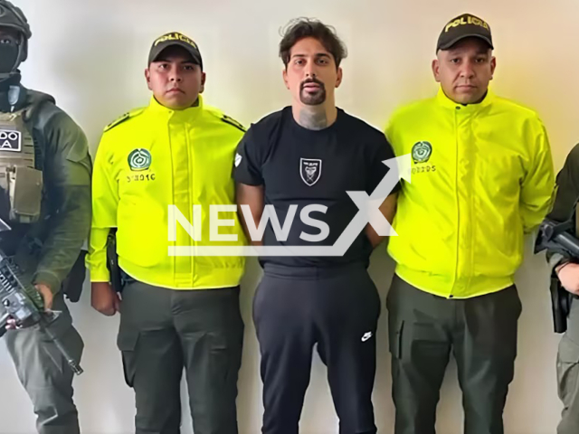 Picture shows the Italian mafia boss with the police, undated. He is transferred to Europe after his arrest in Cartagena, Colombia. Note: Police photo. (National Police/Newsflash)