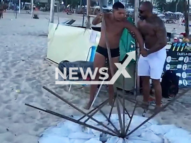 Police arrest drug kingpin Wellington Ferreira Nogueira on Copacabana Beach, Brazil, on Mar.15,2026. He was identified as the head of drug trafficking in Macae. Note: Photo is a screenshot from a video. (PMERJ/Newsflash)