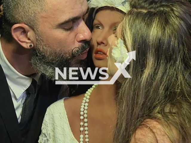 Brazilian influencers Bella Mantovani, 33, and Vagner Macedo, 37, hold a 'wedding' ceremony with realistic doll, undated. They welcomed the doll named Kathleen into their relationship. Note: Licensed photo. (@bellamantovani1, @oferaofc, CO Assessoria/Newsflash)