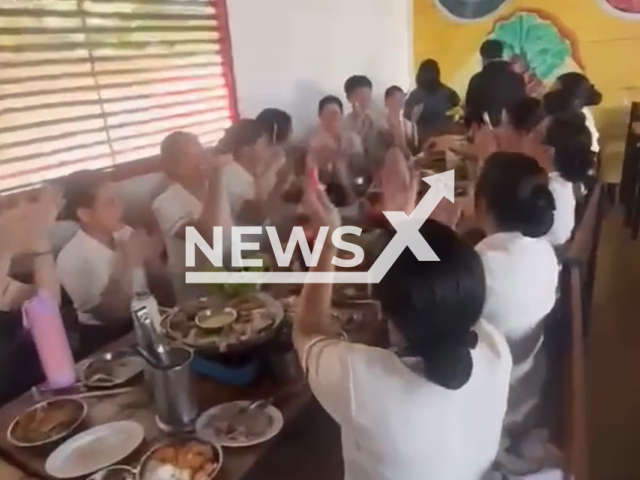 Portable gas stove suddenly explodes during birthday celebration at restaurant in Dagupan City, Philippines, March 12, 2026. Note: Photo is a screenshot from the video (Newsflash)