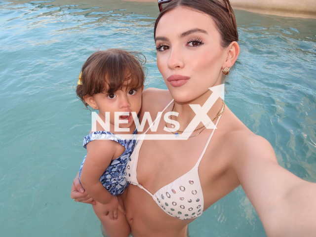 Marianne Gonzaga poses with her daughter Emma in undated photo. An Amber Alert was activated for the child in Mexico. Note: Private photo taken from social media. (@marianne_rc/Newsflash)