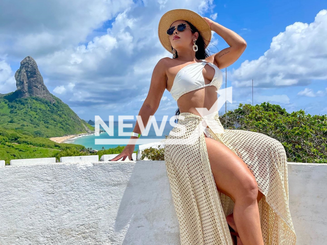 The victim, Flavia Barros, 38, poses in undated photo. She was killed during a trip to Aracaju, Brazil. Note: Private photo taken from social media. (Newsflash)