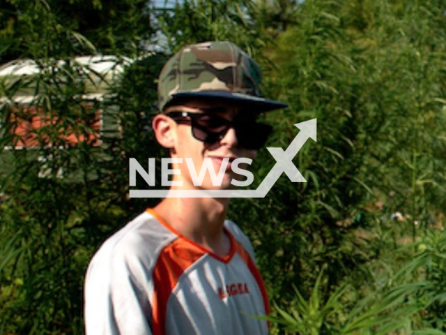 Mattia Giorgi, 31, poses with a dog in undated photo. He was found dead in his home in Piombino, Italy. Note: Private photo. (Newsflash)