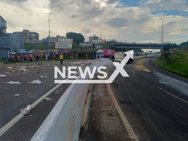 Picture shows the incident scene, undated. A lorry carrying frozen meat overturned in Xanxere, Brazil. Note: Private photo. (PRF/Newsflash)