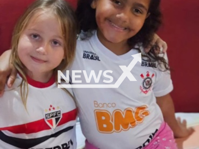 Sofia Emanueli Goncalves de Oliveira, 8, (right) poses with her sister in undated photo. She died after being sucked into the pool pump and getting trapped by her hair underwater at her home in Porto dos Gauchos, Brazil. Note: Private photo taken from social media. (@caio_pintor.vereador/Newsflash/NX)
