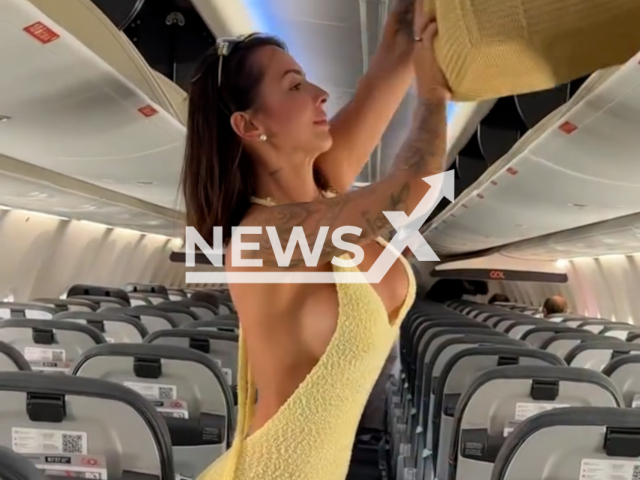 Video shows Karol Rosalin boarding a plane for Fernando de Noronha, Brazil, undated. She was asked by a crew member if she could cover herself at the request of another passenger, who had allegedly felt uncomfortable and considered the outfit inappropriate for the setting. Note: Photo is a screenshot from a video. (@karolrosalin/CO Press/Newsflash/NX)