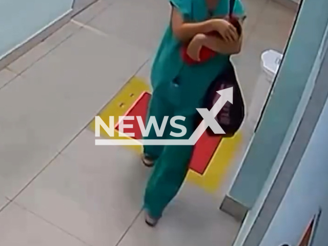 A nursing technician attempts to kidnap a newborn baby at a maternity hospital in Teresina, Brazil. The baby's aunt stopped her when she noticed the woman acting strange. Note: Photo is a screenshot from a video. (Newsflash/NX)